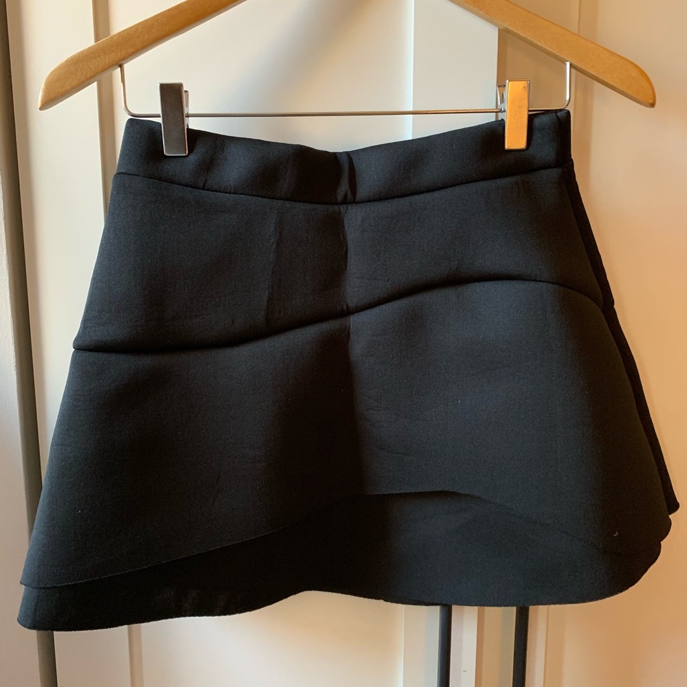 Black scuba material mini skirt